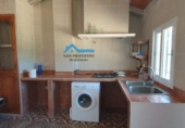Загородный дом с участком на продажу в городе Confrides Фото