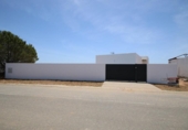 Отдельно стоящий дом с участком на продажу в городе Ayamonte Фото
