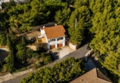 Отдельно стоящий дом с участком на продажу в городе Calpe Фото