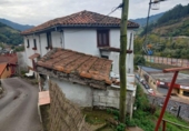 Отдельно стоящий дом с участком на продажу в городе Nembra de Aller Фото