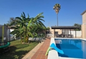 Дом с участком на продажу в городе Palomares del Río Фото