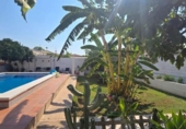 Дом с участком на продажу в городе Palomares del Río Фото