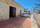 Дом с участком на продажу в городе Chiclana de la Frontera. Фото