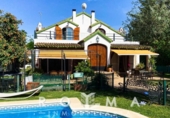 Xalet independent amb terreny en venda a la España, Alcalá de Guadaíra, ref.: TR153837 foto