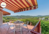 Chalet independiente con terreno en venta en la España, Sant Iscle de Vallalta, ref: TR414869 foto