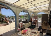 Загородный дом с участком на продажу в городе Torrox. Фото