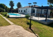 Отдельно стоящий дом с участком на продажу в городе Chiclana de la Frontera Фото