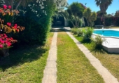 Отдельно стоящий дом с участком на продажу в городе Chiclana de la Frontera Фото
