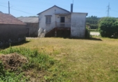 Загородный дом с участком на продажу в городе Narón. Фото