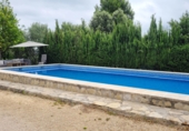 Вилла с участком на продажу в городе Ontinyent. Фото