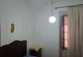 Дом с участком на продажу в городе Гранха-де-Торреермоса. Фото