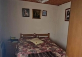 Дом с участком на продажу в городе O Irixo. Фото