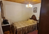 Дом с участком на продажу в городе O Irixo. Фото