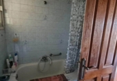 Дом с участком на продажу в городе O Irixo. Фото