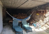 Дом с участком на продажу в городе O Irixo. Фото
