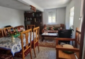 Дом с участком на продажу в городе O Irixo. Фото